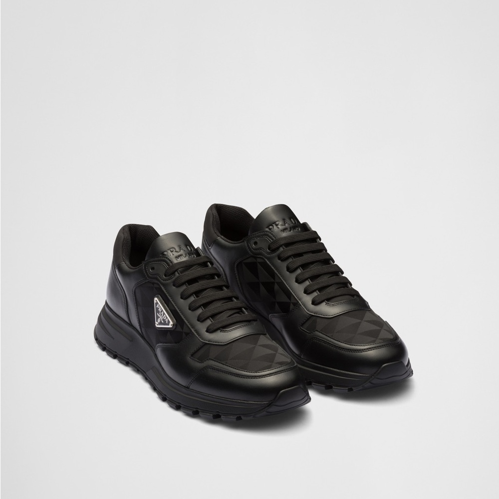 Prada Leather and Re-Nylon Black Sneakers with Chunky Sole and Sleek Design